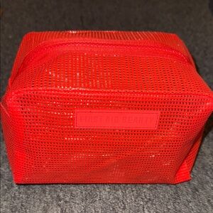 First Aid Beauty Bold Red Mesh Bag